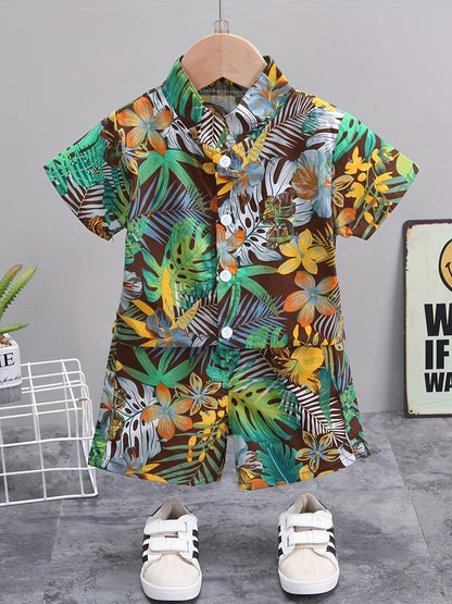Front view of children's summer set showing white short-sleeve top and shorts with leaf & flower print.