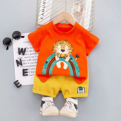 Cute kids' summer set: gray shorts and orange t-shirt with lion print for boys.