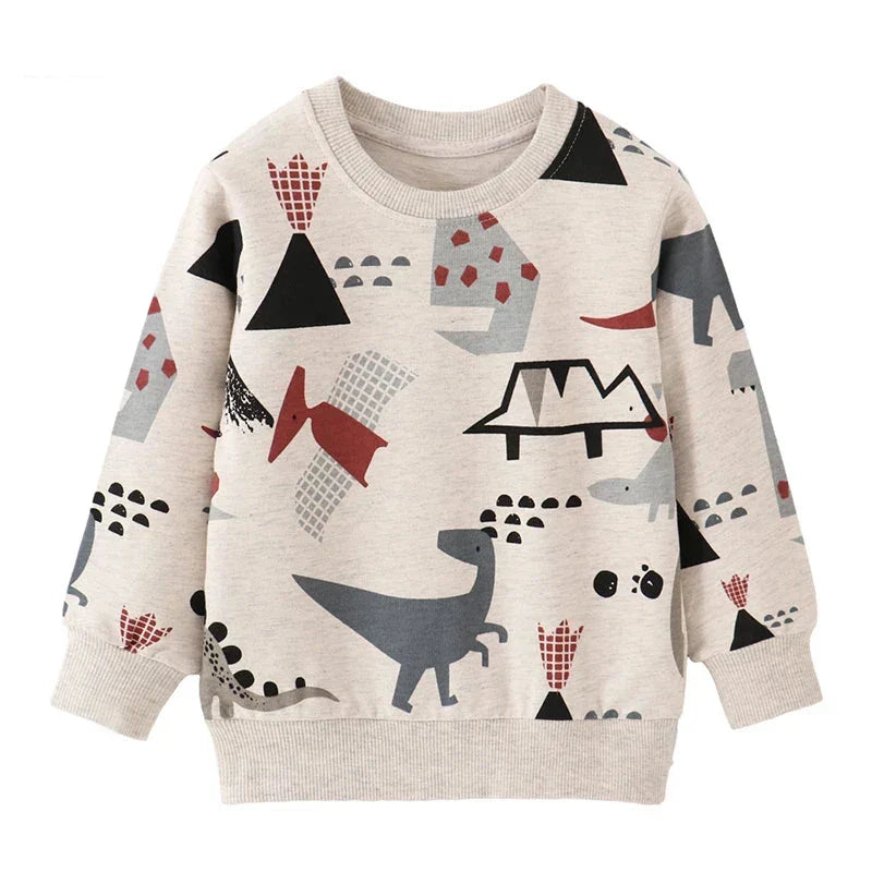 Toddler boy wearing a blue cotton crewneck sweater with a playful dinosaur print.