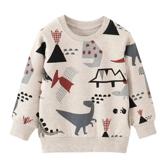 Toddler boy wearing a blue cotton crewneck sweater with a playful dinosaur print.