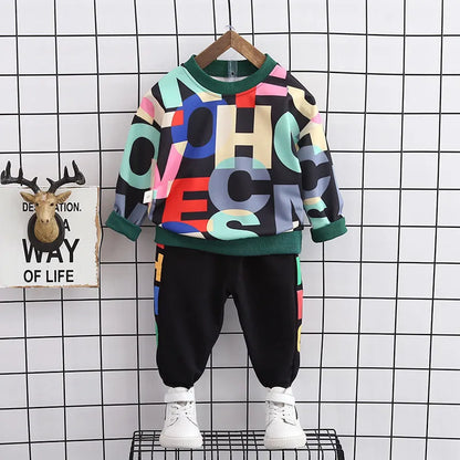 Two-piece cotton outfit for toddler boys: a blue long-sleeve crew neck t-shirt and casual pants.