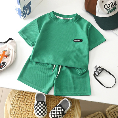 Boys' two-piece casual cotton set in a vibrant yellow, perfect for warm weather