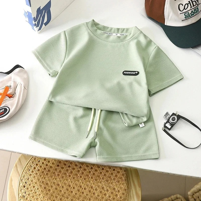 Stylish boys' summer play clothes set, made from breathable blue cotton material