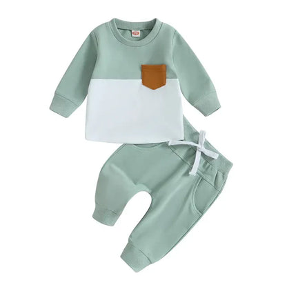 Zoomed-in texture of the cotton blend fabric on a toddler tracksuit, emphasizing softness
