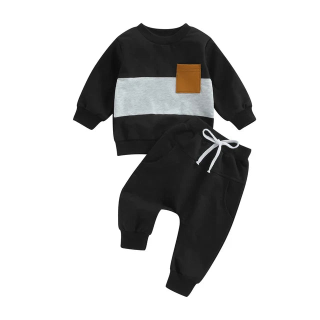 Full view of a toddler boy's yellow tracksuit set, cozy and bright winter activewear