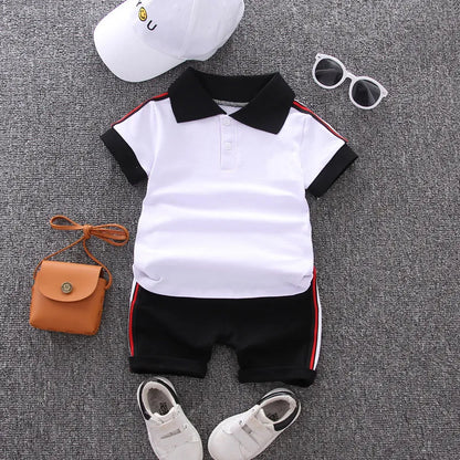 Two-piece cotton outfit for toddler boys, featuring a collared polo and comfortable shorts