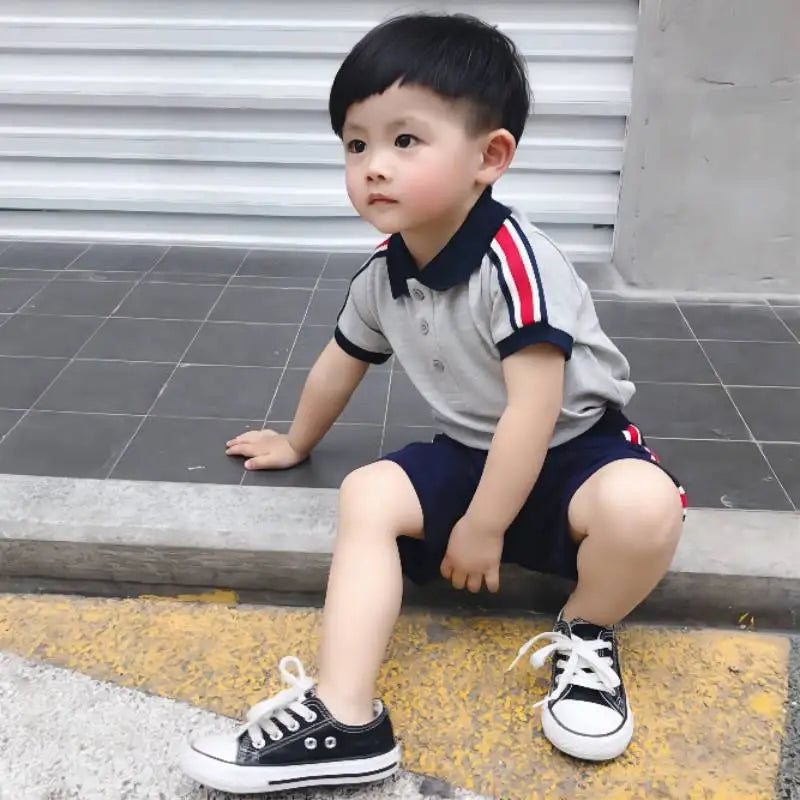 Infant boy's blue cotton polo and shorts, a comfortable and stylish two piece outfit