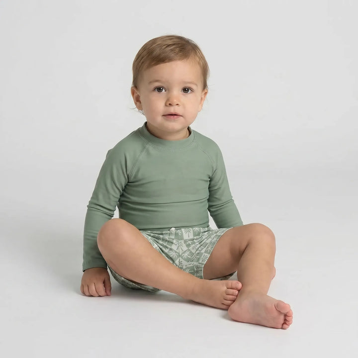 Stylish long sleeve UPF 50+ swim shirt and shorts set for toddler boys, great for sunny days.