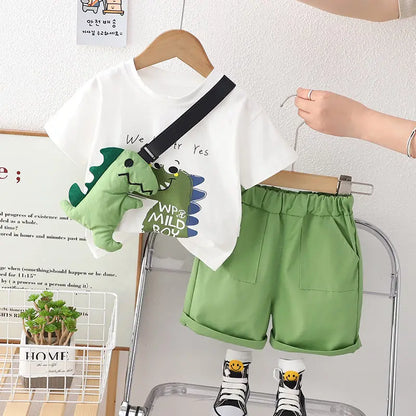 Close-up of a boys' o-neck short sleeve top with a detailed dinosaur print for summer wear
