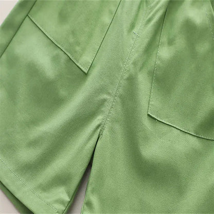 Two-piece boys' clothing set with vibrant dinosaur graphics, perfect for summer playtime