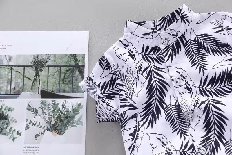 Toddler boys' summer apparel: cute printed top and matching shorts, a must-have for baby fashion.