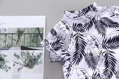 Toddler boys' summer apparel: cute printed top and matching shorts, a must-have for baby fashion.