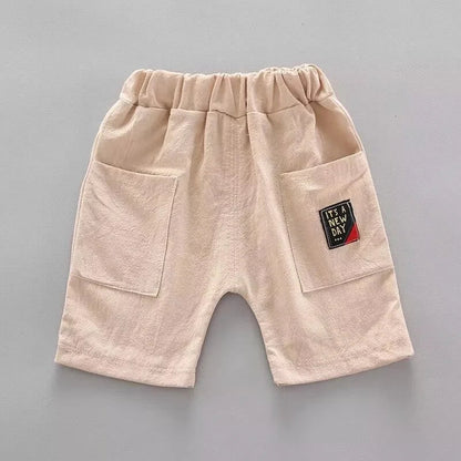Durable toddler boys' summer clothes, cotton printed top and shorts, perfect for active play and summer.