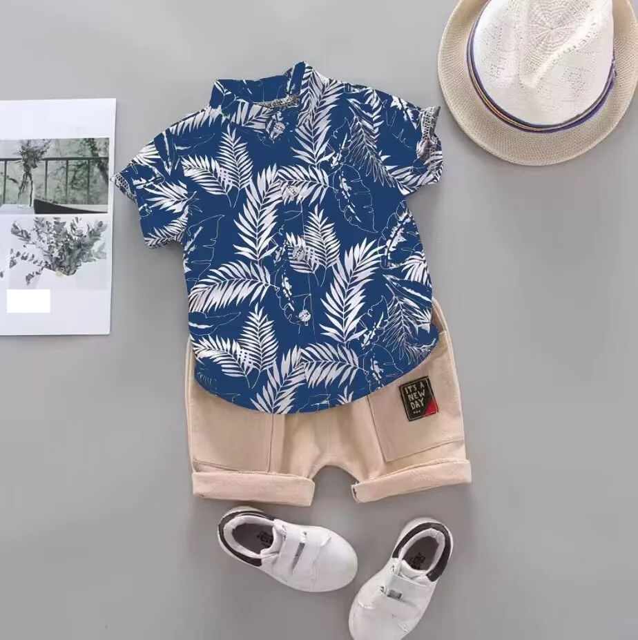 Fashionable infant boys' summer two-piece set, soft cotton with a fun print, perfect for comfortable wear.
