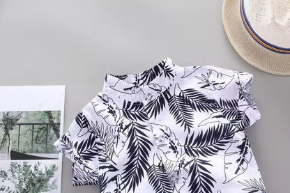 Infant boys' summer wear: soft cotton outfit with a cheerful print, elastic shorts for easy movement.
