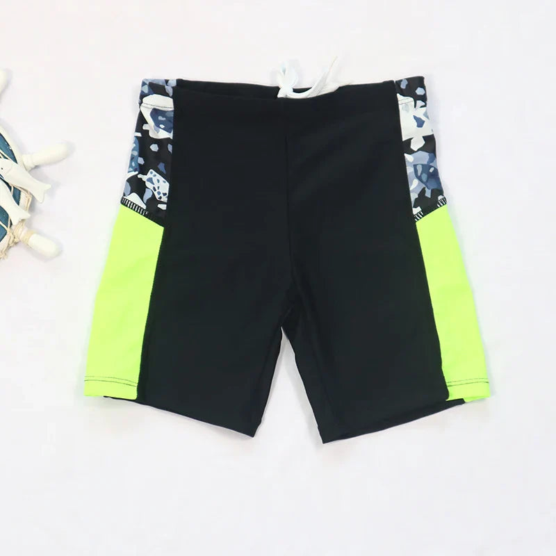 Sun protective boys' swimsuit set featuring long sleeve rash guard, shorts, and hat