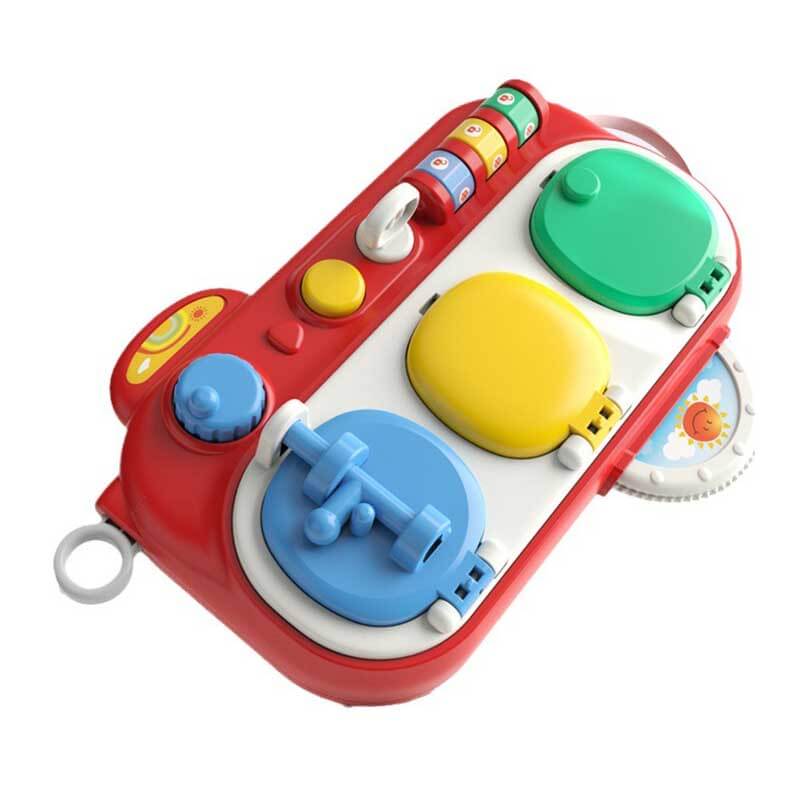 Close-up of a busy board showcasing colorful gears and a zipper, designed for early childhood development.
