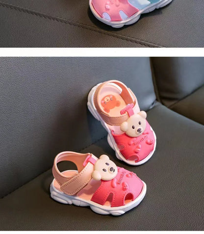 Top-down view of toddler cartoon sandals, highlighting the easy-to-wear strap design