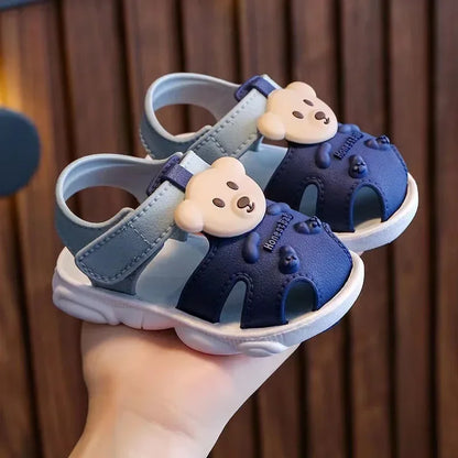 Overhead shot of cartoon beach sandals, highlighting the playful design and quick-dry features