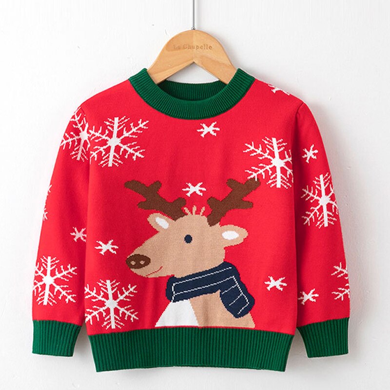 Child modeling a stylish reindeer knitwear sweater, perfect winter fashion outfit