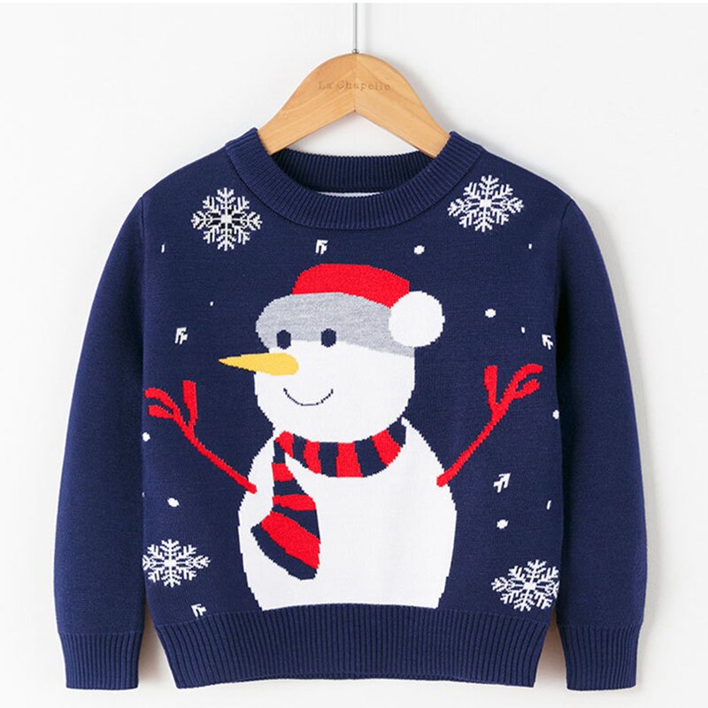 Baby wearing a cozy reindeer cartoon sweater, perfect for winter fashion