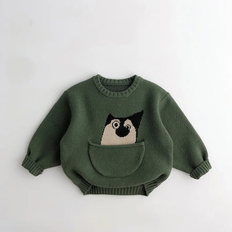 Back view of a unisex kids' animal print cotton sweater, highlighting the quality material.