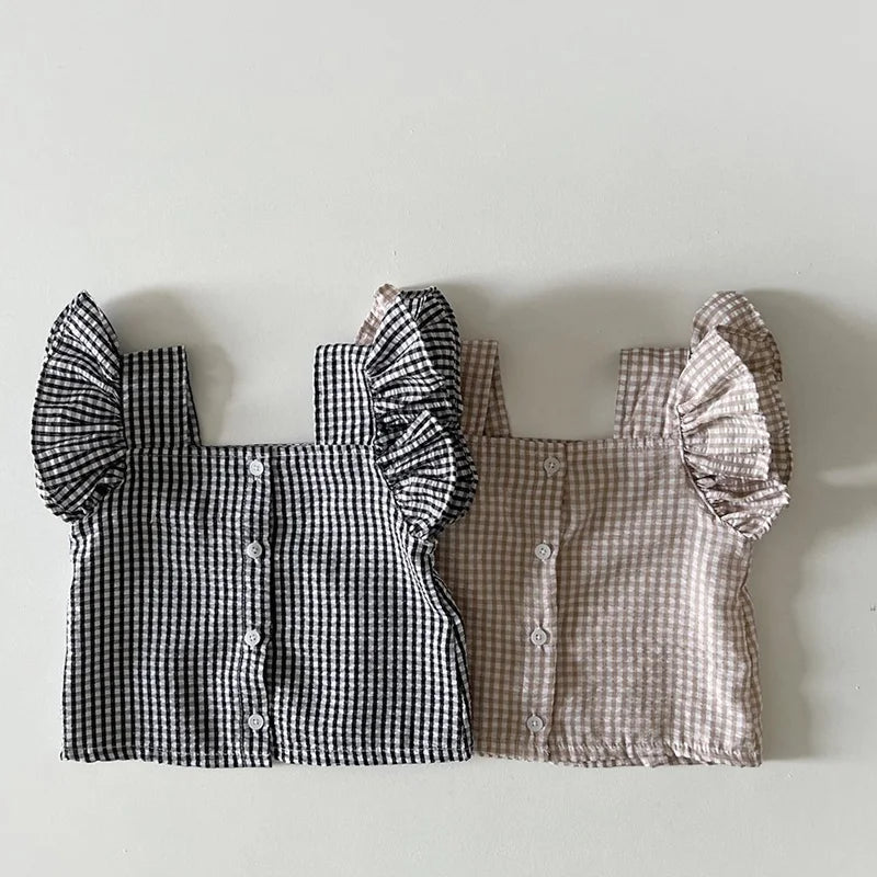 Close-up of a toddler's square neck sleeveless cotton top with matching shorts for summer