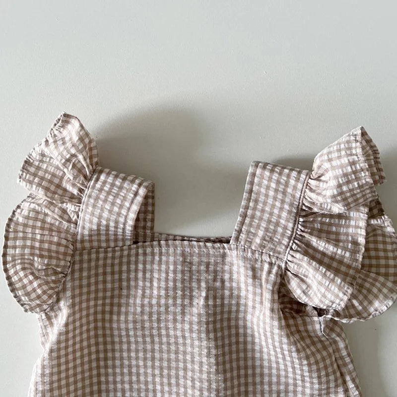 Two-piece infant summer clothing set featuring a square neck cotton top and elastic waist shorts