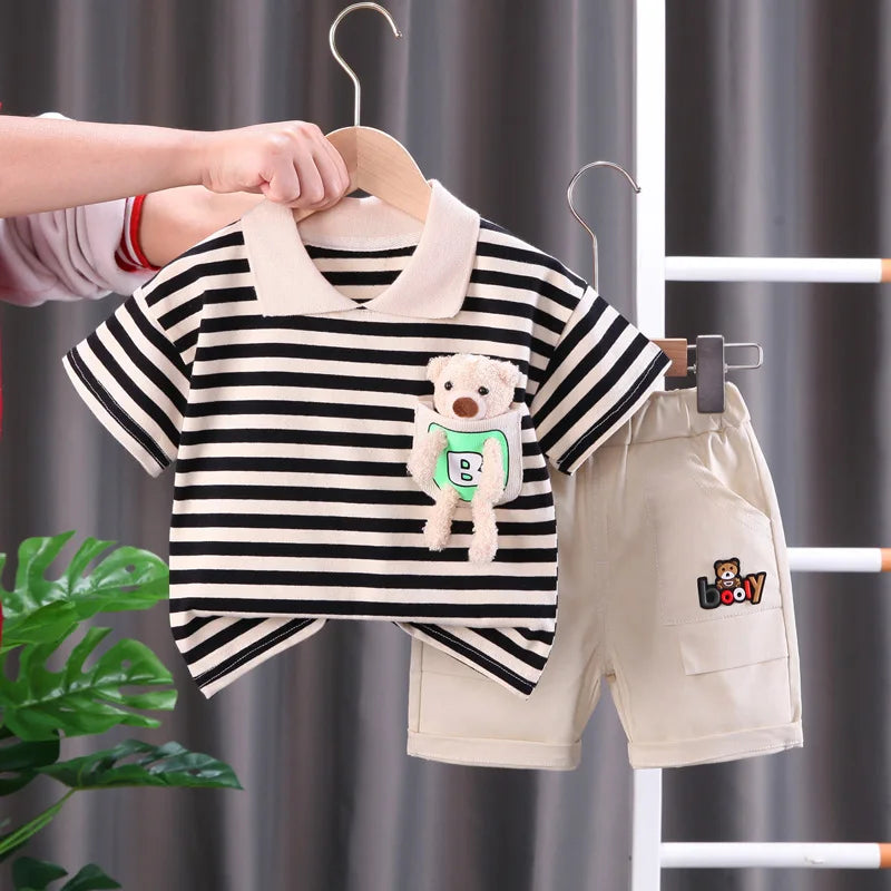 Close-up of a vibrant striped cotton t-shirt from a kids' play clothes set, soft fabric.