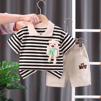 Close-up of a vibrant striped cotton t-shirt from a kids' play clothes set, soft fabric.