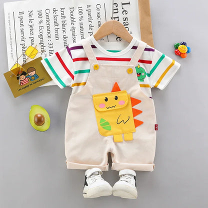 Children wearing a dinosaur graphic tee and matching short overalls, perfect summer play outfit.