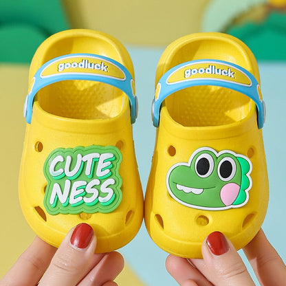 Assortment of colorful dinosaur croc sandals for toddlers, variety pack