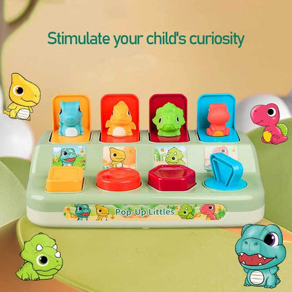 Close-up of a toddler pop-up dinosaur toy, enhancing fine motor skills for infants and toddlers