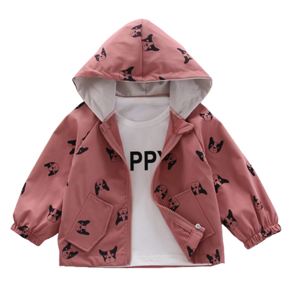 Closeup of a soft cotton toddler hooded jacket featuring an adorable dog print design and a full zipper.