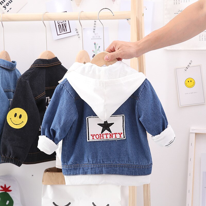 Folded toddler dog print jacket, highlighting the soft cotton material and vibrant dog pattern for baby clothing.