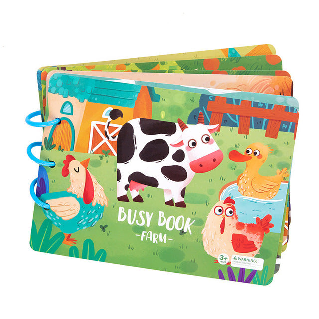 Close-up of a page in Quiet Book displaying numbers and counting activity, early learning for toddlers