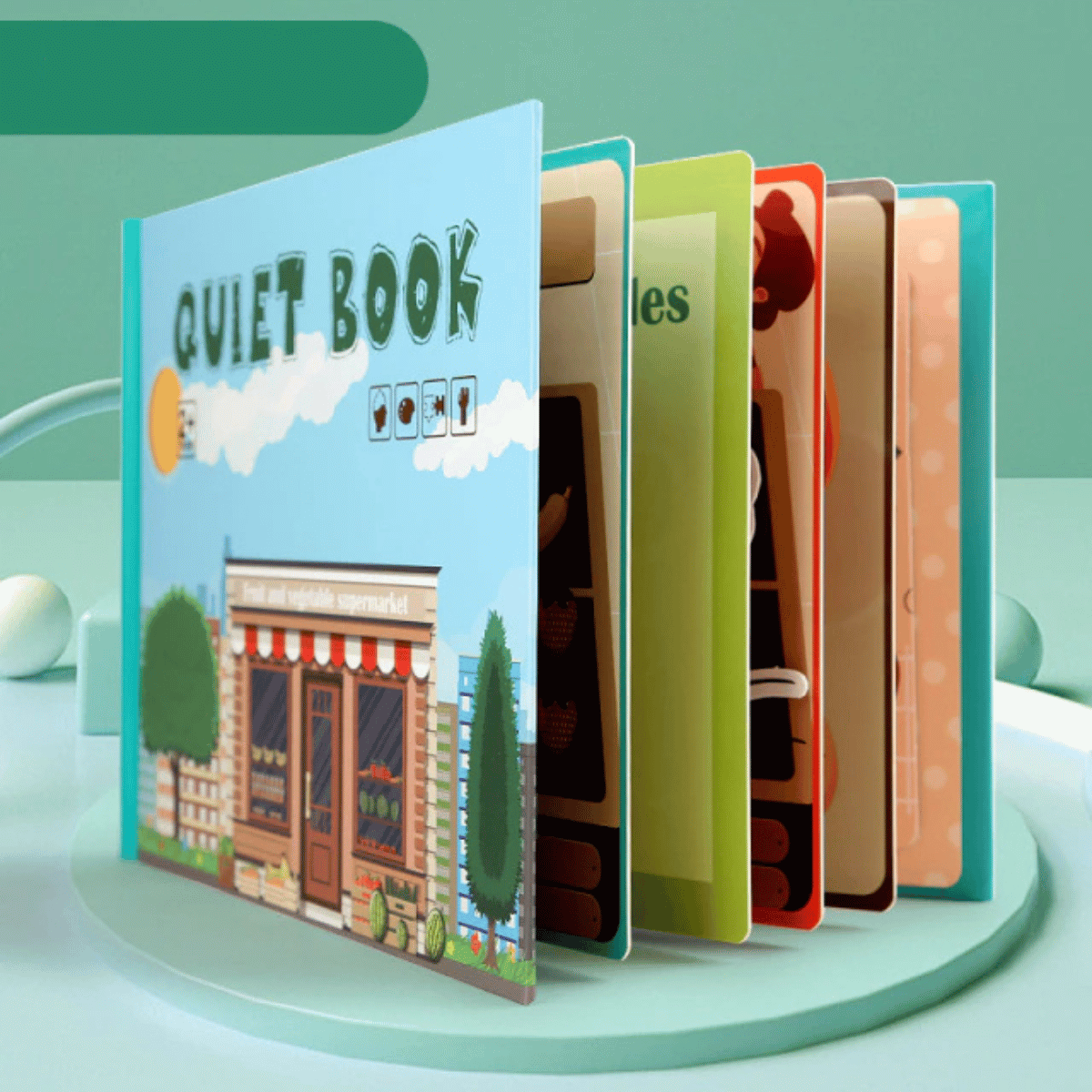 Interactive learning busy book open to a page focusing on shape recognition for toddlers.