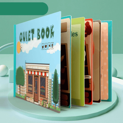 Interactive learning busy book open to a page focusing on shape recognition for toddlers.