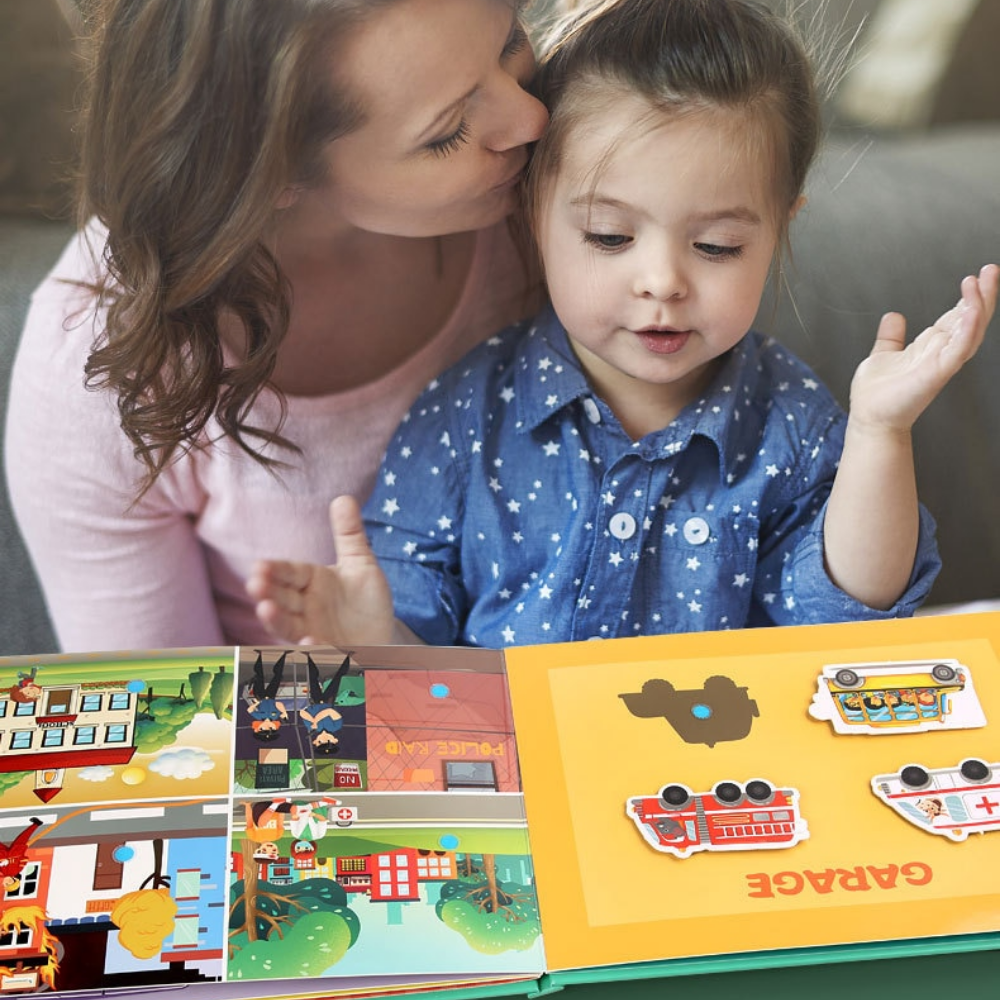 Child matching shapes in a busy book, enhancing cognitive skills and sensory play.