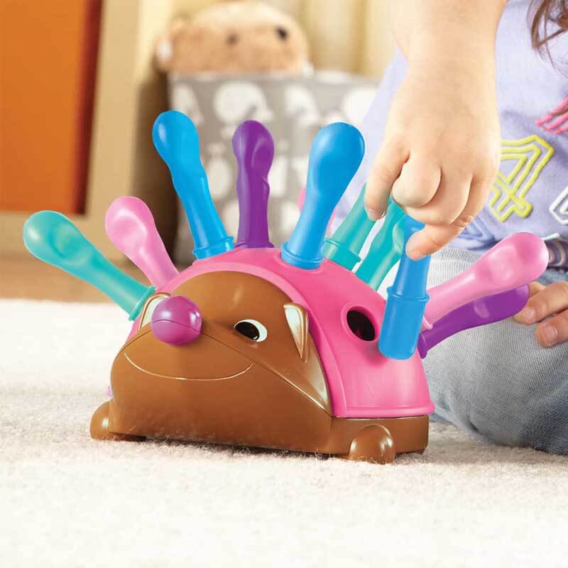 Hedgehog toy with colorful quills, perfect for developing fine motor skills in toddlers