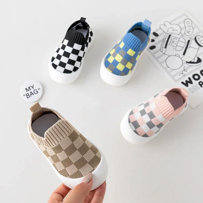 Comfortable toddler fabric slip-on shoes, perfect for first steps and easy wear.