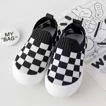 Flexible children's slip-on shoes with anti-slip sole, designed for toddler comfort.