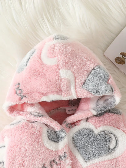 Baby wearing pink heart hooded romper, front view, perfect cozy winter outfit