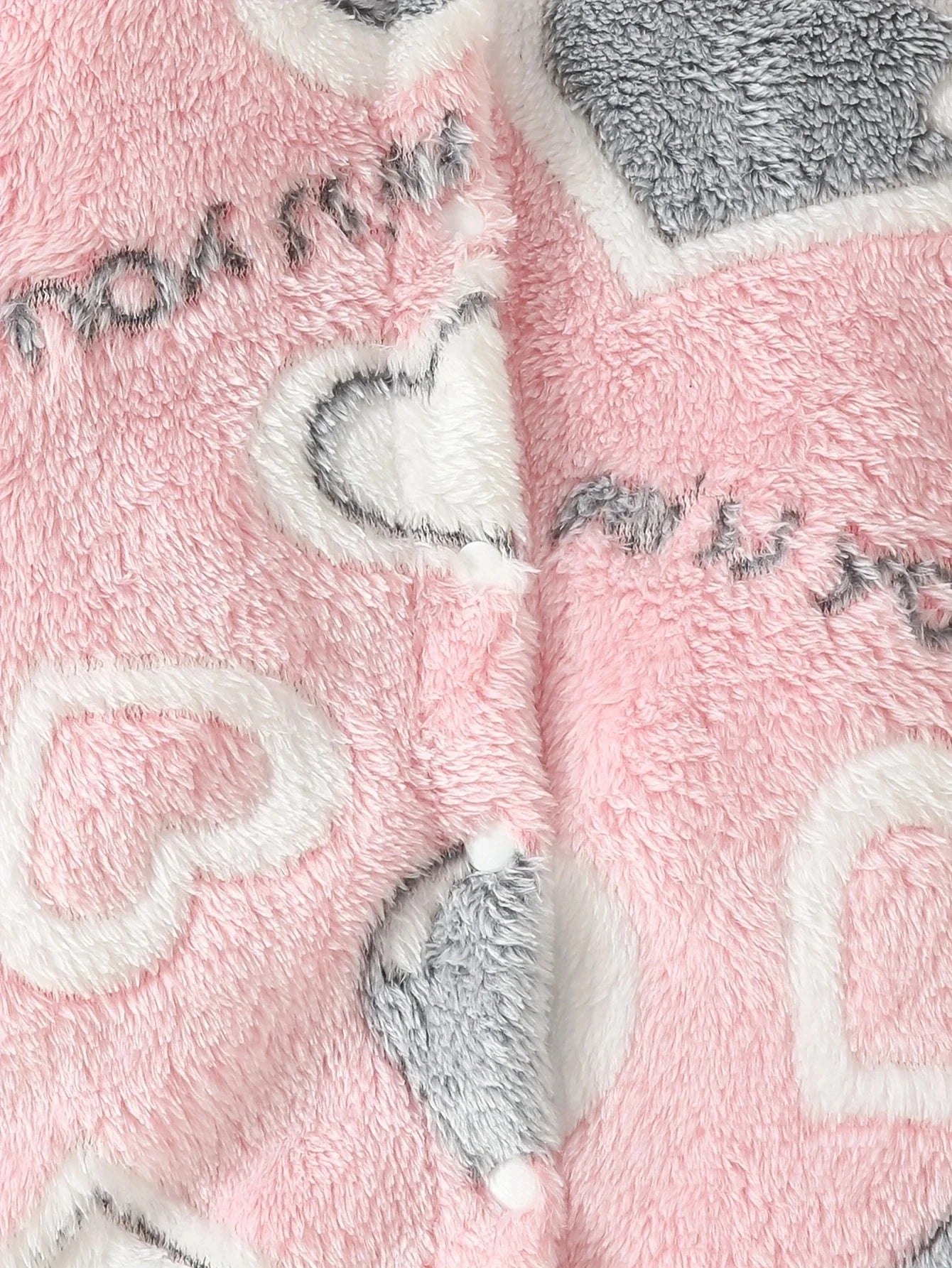 Pink heart hooded baby jumpsuit laid flat, showing full design, warm winter clothes