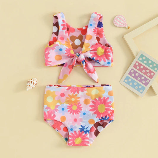 Toddler girl floral print two-piece swimsuit with ruffles, ideal for summer beach days and pool