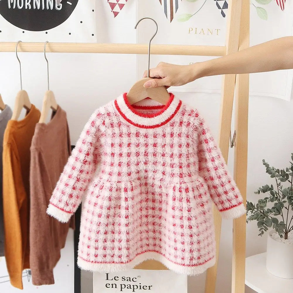 Girls' warm winter dress made of pink fleece, a stylish and comfortable kids clothing option.