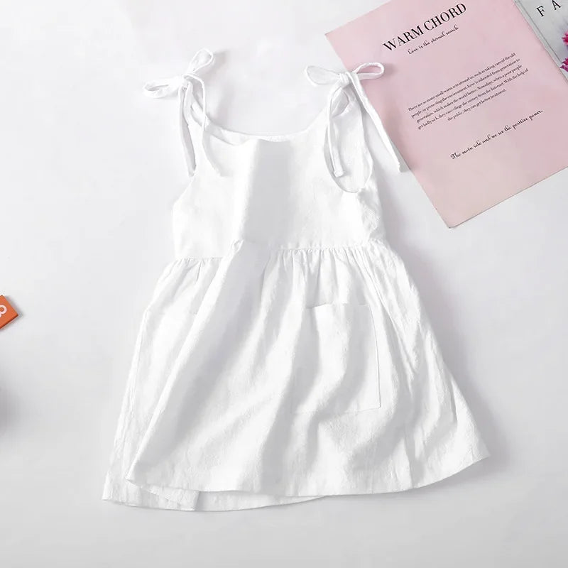 Front view of a white toddler girls' A-line sleeveless cotton dress, summer baby clothing.