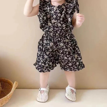 Girls' summer dress with a cheerful floral pattern, a must-have for toddler's wardrobe.