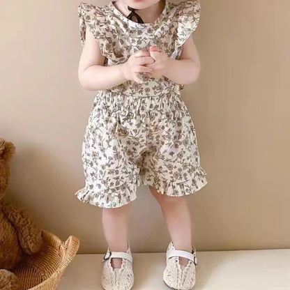 Lightweight cotton floral dress for toddlers, designed for comfort and style in summer.