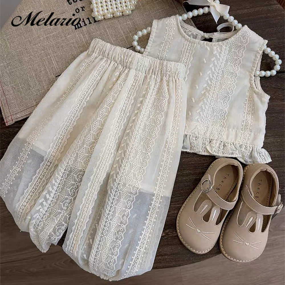 Close up of elastic waistband on hollow lace toddler shorts, comfortable fit for girls apparel